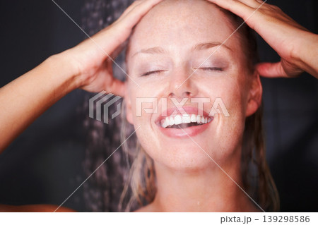 Woman, happy or shower for care in bathroom, skincare or health wellness with water for washing. Young person, grooming and glow in closeup with cleaning body and hair for natural beauty in apartment Woman, happy or shower for care in bathroom, skincare or health wellness with water for washing. Young person, grooming and glow in closeup with cleaning body and hair for natural beauty in apartment 139298586
