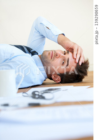 Business man, stress and headache or mental health, floor and exhausted or burnout, paperwork and overwhelmed. Male person, migraine and tired or frustrated, rest and fatigue for mistake and fail Business man, stress and headache or mental health, floor and exhausted or burnout, paperwork and overwhelmed. Male person, migraine and tired or frustrated, rest and fatigue for mistake and fail 139298659