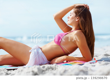 Relax, blue sky and happy woman in bikini on beach for summer vacation, travel adventure and sunshine on tropical island. Natural tan, smile and girl on ocean holiday, sun and peace at sea in Hawaii. Relax, blue sky and happy woman in bikini on beach for summer vacation, travel adventure and sunshine on tropical island. Natural tan, smile and girl on ocean holiday, sun and peace at sea in Hawaii. 139298670