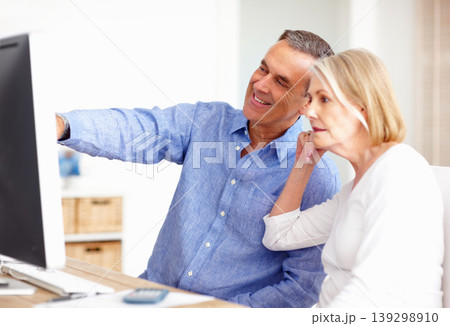 Investment, budget or senior couple with computer in home for retirement savings or pension planning. Banking, financial or mature man talking to a woman for house bills or profit growth on laptop Investment, budget or senior couple with computer in home for retirement savings or pension planning. Banking, financial or mature man talking to a woman for house bills or profit growth on laptop 139298910
