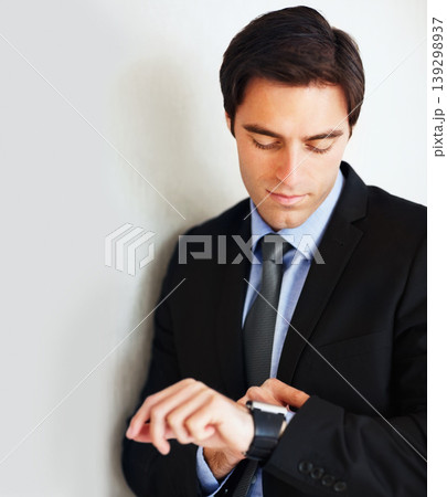 Time, watch and a young business man in studio on a white background for delay while waiting for an appointment. Schedule, late and impatient with male employee in a suit for professional work Time, watch and a young business man in studio on a white background for delay while waiting for an appointment. Schedule, late and impatient with male employee in a suit for professional work 139298937