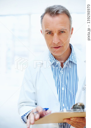 Health, question and doctor with checklist on clipboard, chart or survey for insurance and medical information. Healthcare, man and portrait with paperwork, report or check up at clinic or hospital Health, question and doctor with checklist on clipboard, chart or survey for insurance and medical information. Healthcare, man and portrait with paperwork, report or check up at clinic or hospital 139298970