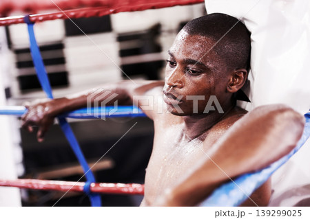 Man, boxing ring and sweat or tired in gym for fitness exercise, professional athlete and rest. Black person, exhausted and competition punch practice or goals training, mma fight in arena battle Man, boxing ring and sweat or tired in gym for fitness exercise, professional athlete and rest. Black person, exhausted and competition punch practice or goals training, mma fight in arena battle 139299025