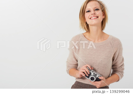 Portrait, happy woman and camera for photography in studio with mock up on white background. Swedish model, hand and smiling with lens for equipment in creative career, picture or memory in space 139299046