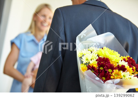 Husband, wife and hiding flowers for surprise, smile and happiness with baby, love and appreciation. Bouquet, romance and good news for marriage, relationship and announcement with romantic partner Husband, wife and hiding flowers for surprise, smile and happiness with baby, love and appreciation. Bouquet, romance and good news for marriage, relationship and announcement with romantic partner 139299062