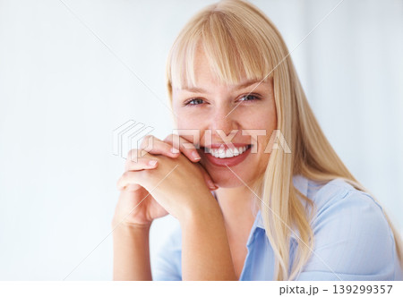 Portrait, confidence and happy business woman in office, workplace or corporate company on mockup space in Switzerland. Face, smile or professional entrepreneur, blonde worker or young employee agent Portrait, confidence and happy business woman in office, workplace or corporate company on mockup space in Switzerland. Face, smile or professional entrepreneur, blonde worker or young employee agent 139299357
