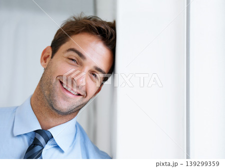 Businessman, portrait and smile in office for career, professional and employee at corporate job. Entrepreneur, face and person for happy, confidence and pride with calm expression at workplace 139299359