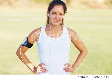 Fitness, earphones and portrait of woman in park for training, workout or marathon with music. Face, smile or lady runner with positive mindset, energy or attitude in countryside, freedom or workout 139299419
