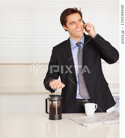 Happy businessman, phone call and coffee for discussion or communication in kitchen at home. Man or employee smile and talking on mobile smartphone for morning conversation or caffeine drink at house 139299490