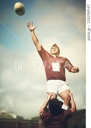 Rugby, teamwork and ball and man on field for sports training, health and stadium practice. Challenge, competition and performance with male person in outdoor pitch for exercise, games and workout 139299547