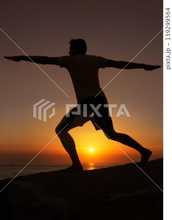Silhouette, man or stretching with hands for yoga, health and wellness on beach with sunset and zen. Person, shadow and pilates or arm workout for balance, mindfulness or healthy body by ocean or sea 139299564