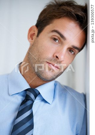 Businessman, portrait and serious in office for career, professional and employee at corporate job. Entrepreneur, face or person for assertive, confidence and pride with calm expression at workplace 139300577