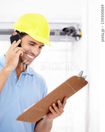 Technician, happy and phone call for security camera, checklist and CCTV installation or services in home. Man or contractor reading clipboard for surveillance information, solution or mobile support Technician, happy and phone call for security camera, checklist and CCTV installation or services in home. Man or contractor reading clipboard for surveillance information, solution or mobile support 139300684