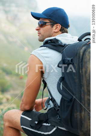 Fitness, rest and thinking of nature hiking with backpack for workout, training or exercise in relax freedom break. View, man or planning mountains hike for health, wellness and summer Brazil sports 139300689