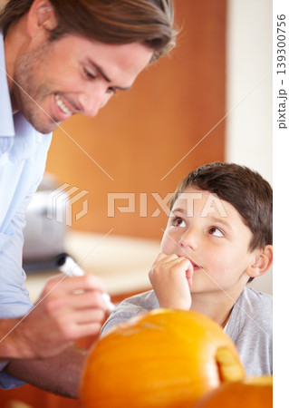 Halloween, pumpkin and father with child in the kitchen for holiday celebration at home. Creative, smile and happy dad with boy kid bonding and carving vegetable for decoration or tradition at house. Halloween, pumpkin and father with child in the kitchen for holiday celebration at home. Creative, smile and happy dad with boy kid bonding and carving vegetable for decoration or tradition at house. 139300756