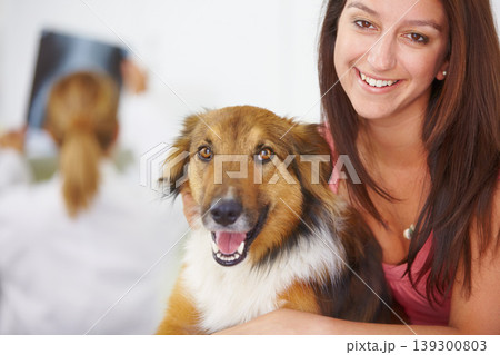 Veterinary portrait, dog and happy woman, owner or client for medical help, healing services or animal nursing, support or healthcare. Patient, vet and smile for pet canine consultation, test or exam 139300803