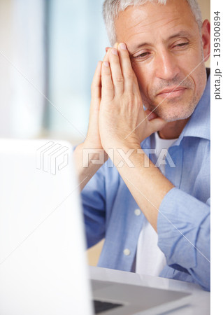 Mature man, laptop and thinking in home, serious face and stress for business. Hands, technology and communication for problems, vision and concerned with remote work, overworked and contemplating Mature man, laptop and thinking in home, serious face and stress for business. Hands, technology and communication for problems, vision and concerned with remote work, overworked and contemplating 139300894