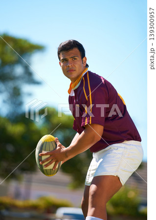 Fitness, sports and man with rugby, ball or pass at a field for training, match or hobby outdoor. Football, face and male athlete at a park for game day, performance or workout, skill or practice Fitness, sports and man with rugby, ball or pass at a field for training, match or hobby outdoor. Football, face and male athlete at a park for game day, performance or workout, skill or practice 139300957