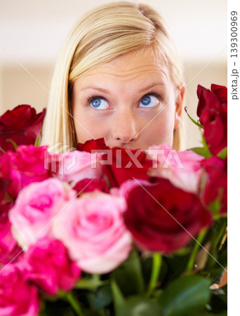 Woman, rose bouquet and eyes with closeup, beauty and arrangement with studio background, surprise and gift. Look, female model and flowers for love, present and valentines day with romantic gesture 139300969
