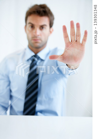 Businessman, hands and stop for wait, no or halt in gesture, protest or take a stand at office. Man, male person or employee showing palm for negative sign, disapproval or disagree at workplace Businessman, hands and stop for wait, no or halt in gesture, protest or take a stand at office. Man, male person or employee showing palm for negative sign, disapproval or disagree at workplace 139301348
