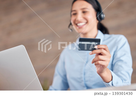 Happy woman, laptop and credit card at call center for payment, customer service or ecommerce at office. Female person, consultant or business agent smile with debit for online banking and support 139301430