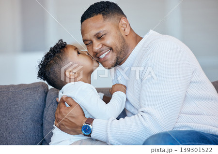 Love, kiss and happy family kid, father and papa care, support and happiness for young boy, youth or son. Condominium lounge sofa, home affection and apartment dad bonding, smile and relax with child Love, kiss and happy family kid, father and papa care, support and happiness for young boy, youth or son. Condominium lounge sofa, home affection and apartment dad bonding, smile and relax with child 139301522