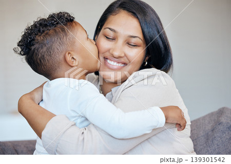 Hug, kiss and happy family kid, mom and mama care, support and smile for young youth boy on home living room couch. Security, affection and Costa Rica mother bonding, trust and love embrace for child Hug, kiss and happy family kid, mom and mama care, support and smile for young youth boy on home living room couch. Security, affection and Costa Rica mother bonding, trust and love embrace for child 139301542
