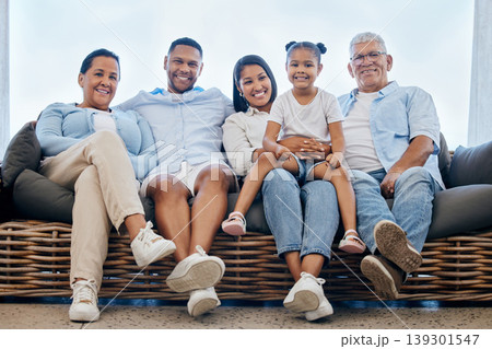 Portrait, home and family on a couch, smile and relax with happiness, weekend break and generations. Grandparents, mother or father with children, kids and rest with joy, calm and love in a lounge 139301547
