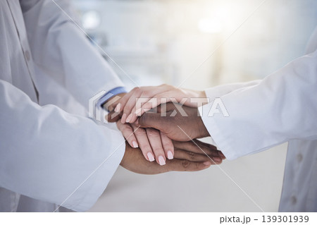 Hands, teamwork and doctors in the hospital for unity or solidarity in medicine or healthcare. Medical, support or motivation with health professionals closeup in a clinic for treatment goals Hands, teamwork and doctors in the hospital for unity or solidarity in medicine or healthcare. Medical, support or motivation with health professionals closeup in a clinic for treatment goals 139301939