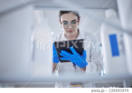 Woman, medical research and tablet in lab for test results check, future pill trial or science study. Female person, digital device and report or review breakthrough hope, idea in work biotechnology Woman, medical research and tablet in lab for test results check, future pill trial or science study. Female person, digital device and report or review breakthrough hope, idea in work biotechnology 139301974