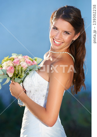 Bride, wedding portrait and smile outdoor for love, commitment and celebration ceremony with confidence. Jewelry, woman and happy from marriage, romance and formal event in a garden with bouquet Bride, wedding portrait and smile outdoor for love, commitment and celebration ceremony with confidence. Jewelry, woman and happy from marriage, romance and formal event in a garden with bouquet 139302238