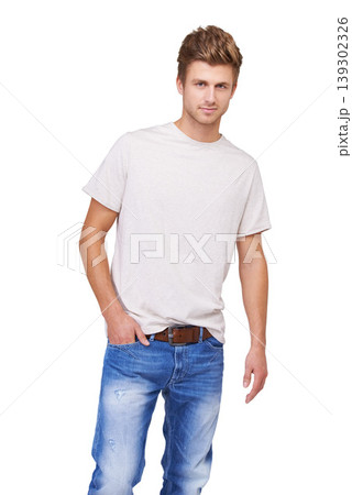 Fashion, portrait and young man in a studio with casual, stylish and trendy outfit for confidence. Handsome, cool and full body of male model with tshirt and jeans style isolated by white background. 139302326