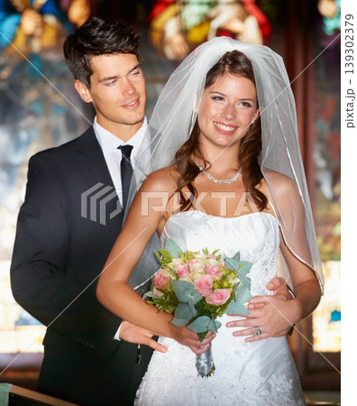 Happy couple, wedding and smile at church for marriage, love or commitment together at ceremony. Married man and woman with bouquet of roses, flowers and bridal dress for relationship or celebration Happy couple, wedding and smile at church for marriage, love or commitment together at ceremony. Married man and woman with bouquet of roses, flowers and bridal dress for relationship or celebration 139302379