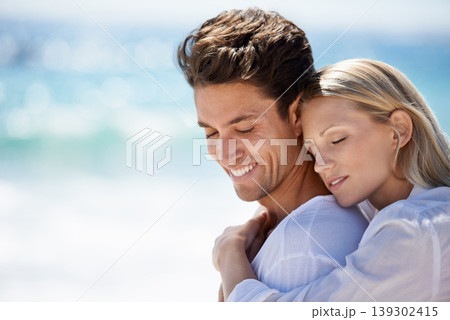 Happy, couple and hug by the beach on travel, vacation and trip date with a smile and embrace. Romance, summer and holiday by the sea and ocean with young people together on a break in Miami outdoor Happy, couple and hug by the beach on travel, vacation and trip date with a smile and embrace. Romance, summer and holiday by the sea and ocean with young people together on a break in Miami outdoor 139302415