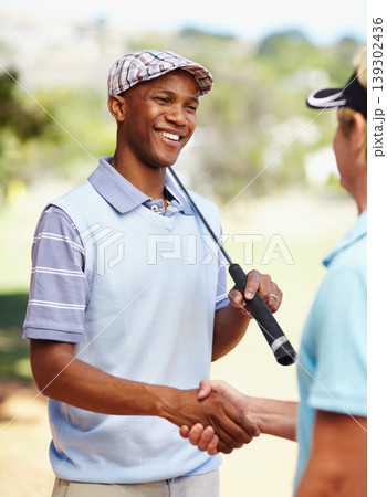 Sports, golf and athletes shaking hands on a field for competition, tournament or event. Smile, agreement and professional happy men golfers with handshake for welcome on an outdoor grass course. 139302436