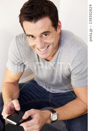Typing, happy and portrait of man with phone for social media, networking and online chatting. Smile, relax and person on cellphone for texting, message and searching website, internet and blog Typing, happy and portrait of man with phone for social media, networking and online chatting. Smile, relax and person on cellphone for texting, message and searching website, internet and blog 139302624