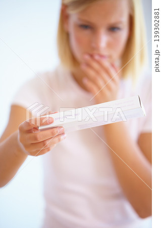 Anxiety, shock and woman with pregnancy test in bathroom waiting for results, news and surprise. Motherhood, pregnant and worried person with medical testing kit for fertility or ovulation at home Anxiety, shock and woman with pregnancy test in bathroom waiting for results, news and surprise. Motherhood, pregnant and worried person with medical testing kit for fertility or ovulation at home 139302881