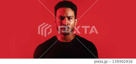Serious, man and portrait with banner in studio of fighter ready for battle on a red background. Male person, neon and fitness with confidence for performance training or commitment on mockup space Serious, man and portrait with banner in studio of fighter ready for battle on a red background. Male person, neon and fitness with confidence for performance training or commitment on mockup space 139302916