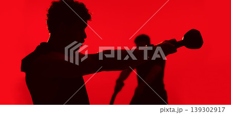 Fitness, collage or people in studio with strength training, kettlebell or battle rope in bodybuilding. Exercise, silhouette or athletes with equipment, joint workout or muscle gain on red background 139302917