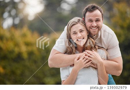 Happy couple, hug or embrace with portrait in backyard, garden or outside with love, care and support for bond. Man, woman and smile with excited expression for marriage, romance and relationship Happy couple, hug or embrace with portrait in backyard, garden or outside with love, care and support for bond. Man, woman and smile with excited expression for marriage, romance and relationship 139302979