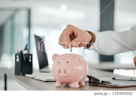 Hand, businessman and coin in piggy bank, deposit and saving for finance, investment and security. Change, money box and cash growth, container and profit for retirement, banking and safety in future 139303092