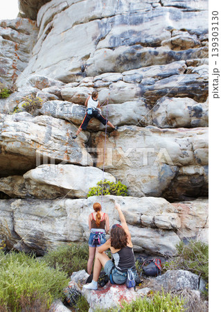 Mountains, friends and rock climbing with adventure, fitness and hiking with support, on cliff or nature. People, outdoor or group with landscape, natural journey or travel with environment or energy Mountains, friends and rock climbing with adventure, fitness and hiking with support, on cliff or nature. People, outdoor or group with landscape, natural journey or travel with environment or energy 139303130