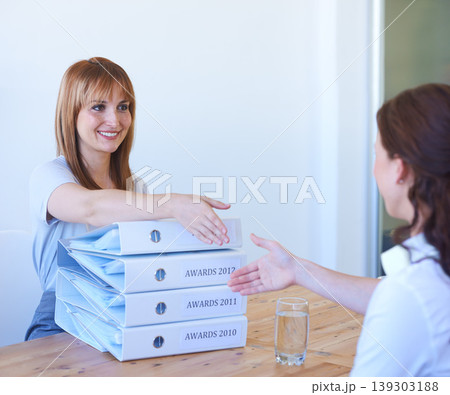 Women, management and handshake in interview for welcome, onboarding and hiring in office or workplace. Business, professional or people with documents, paperwork or shaking hands in meeting or smile Women, management and handshake in interview for welcome, onboarding and hiring in office or workplace. Business, professional or people with documents, paperwork or shaking hands in meeting or smile 139303188