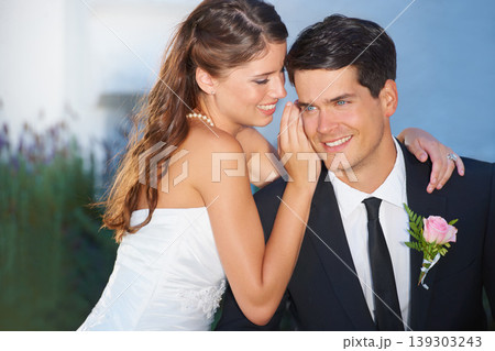 Woman, man and whisper at wedding, smile and thinking outdoor with secret, story and love with romance. Couple, marriage and happy with talking, gossip or news with care, commitment and celebration Woman, man and whisper at wedding, smile and thinking outdoor with secret, story and love with romance. Couple, marriage and happy with talking, gossip or news with care, commitment and celebration 139303243