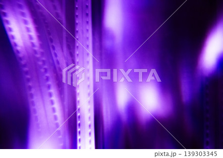 Blurred purple violet magical light effect on black background. Lo-fi effect. Blurred purple violet magical light effect on black background. Lo-fi effect. 139303345