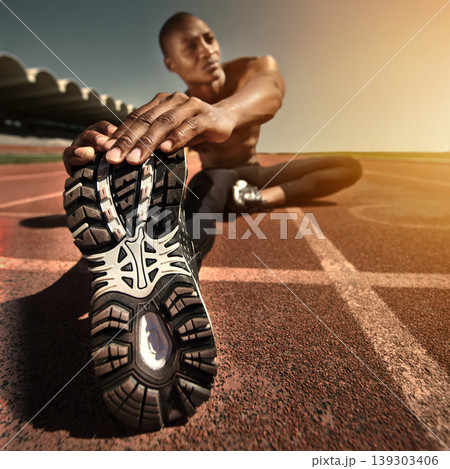 Man, face and stretching leg on ground, outdoors and fitness for health, sports and performance. Black male person, athlete and warmup on track, workout and commitment or ready, train and cardio Man, face and stretching leg on ground, outdoors and fitness for health, sports and performance. Black male person, athlete and warmup on track, workout and commitment or ready, train and cardio 139303406