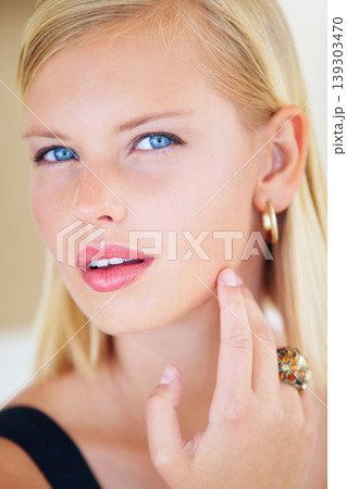 Woman, portrait and beauty or skin in closeup, jewelry and elegant or luxury, care and cosmetics. Female person, stylish and face of businesswoman, earring and accessories for wellness, relax or zoom 139303470