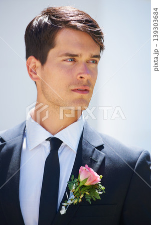 Groom man, thinking and outdoor at wedding in suit, rose or flower for celebration, event or party. Person, vision and ideas for choice, marriage or commitment to relationship with floral decoration Groom man, thinking and outdoor at wedding in suit, rose or flower for celebration, event or party. Person, vision and ideas for choice, marriage or commitment to relationship with floral decoration 139303684