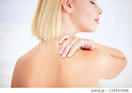 Woman, skincare and touch shoulder in studio with back, eyes closed and beauty by white background. Girl, model and blonde with smooth skin, cosmetic change and transformation with glow for wellness Woman, skincare and touch shoulder in studio with back, eyes closed and beauty by white background. Girl, model and blonde with smooth skin, cosmetic change and transformation with glow for wellness 139303686