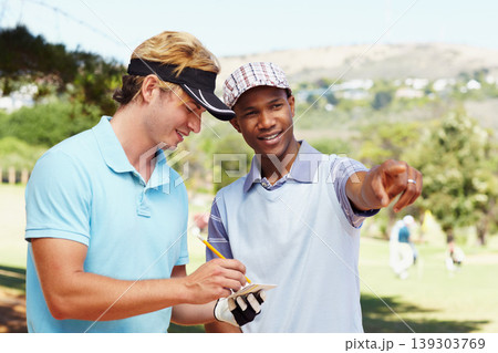 Sports, golf and athletes in discussion on field writing notes for competition or tournament strategy. Fitness, smile and professional happy male players talking for hobby on an outdoor course. 139303769